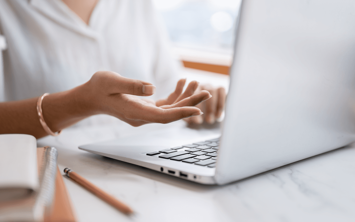Image with hand and laptop