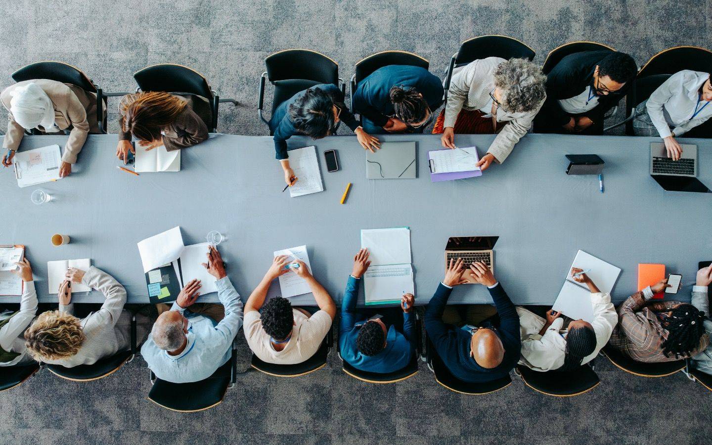 Team members sitting at the table